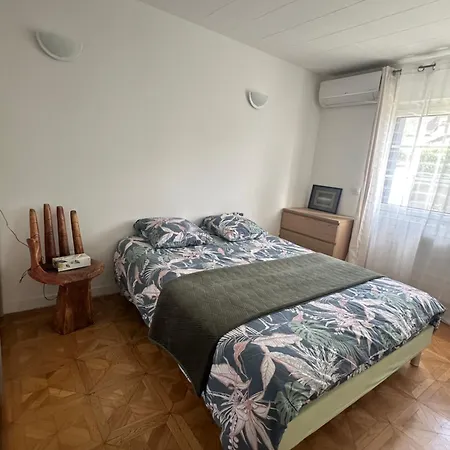 Maison Cosy Climatisee Avec Jardin Holiday home *